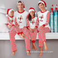 Feliz Navidad con estampado de pijamas navideños familiares